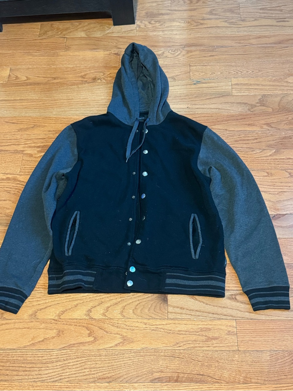 Ring of Fire Black Body with Charcoal Gray Sleeves Hooded Varsity Jacket